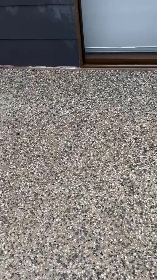 Finished ConcreteWorX exposed aggregate surface outside an Adelaide home